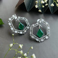 Ad Della earrings
