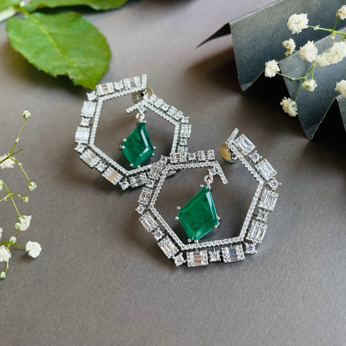 Ad Della earrings