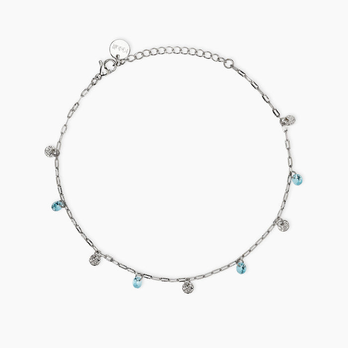 Cavigliera con charms martellati e glass azzurri