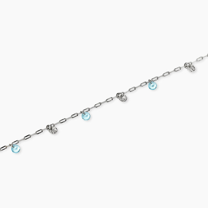 Cavigliera con charms martellati e glass azzurri