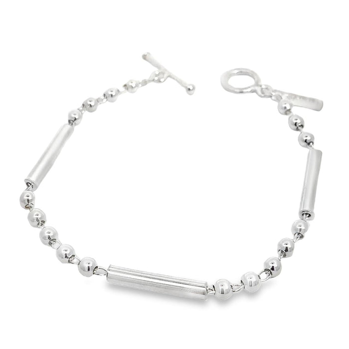 photo of a silver link bracelet made of bars and ball on a white background