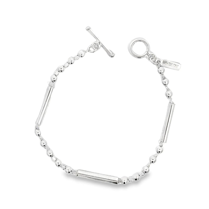 photo of a silver link bracelet made of bars and ball on a white background