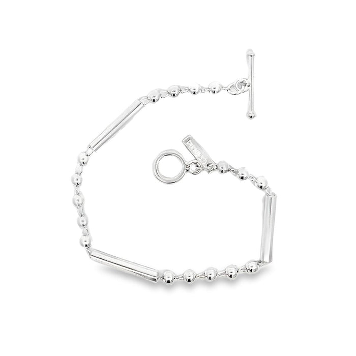 photo of a silver link bracelet made of bars and ball on a white background