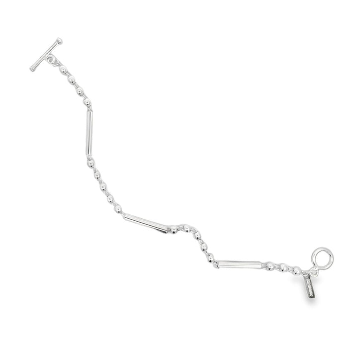 photo of a silver link bracelet made of bars and ball on a white background