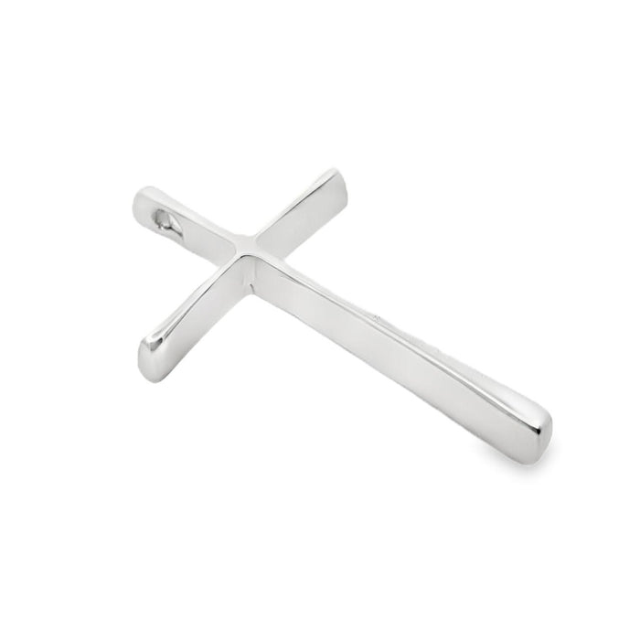 photo of a silver slender long cross pendant on a white background