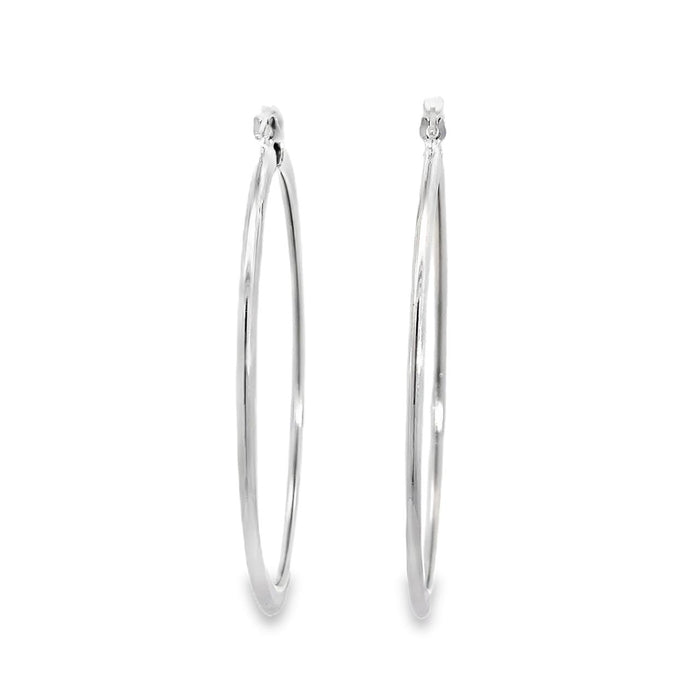 photo of a pair of oval silver hoop earrings on a white back ground