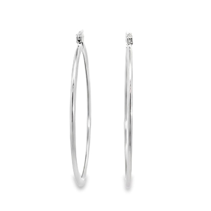photo of a pair of oval silver hoop earrings on a white back ground