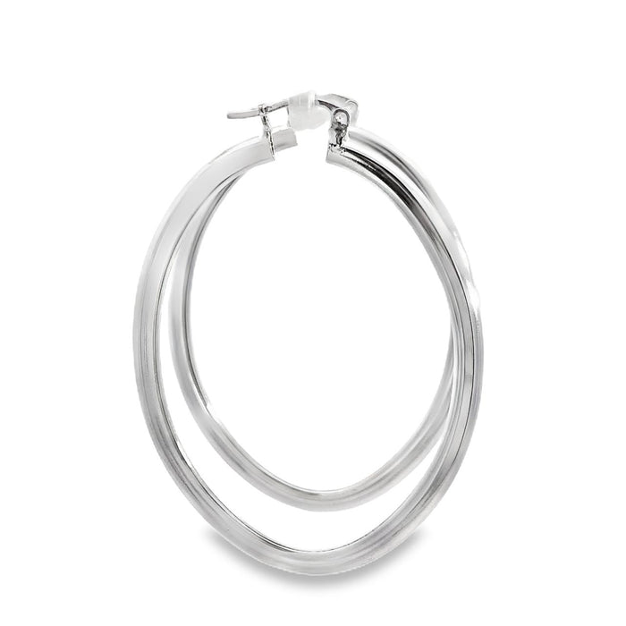 photo of a pair of oval silver hoop earrings on a white back ground side view