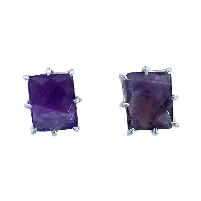 photo of a pair of silver amethyst earrings on a white background