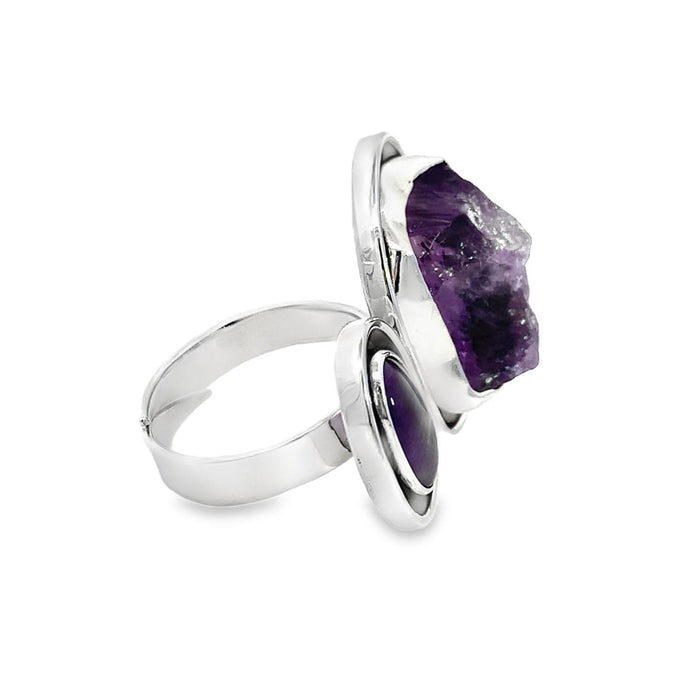 photo of a two stone amethyst silver ring with black oxidation surround on a white background side view
