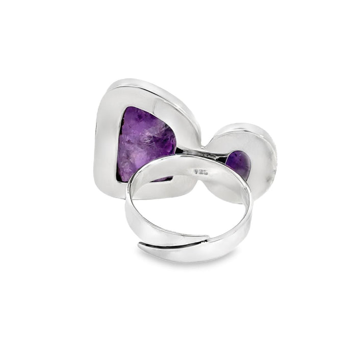 photo of a two stone amethyst silver ring with black oxidation surround on a white background rear view