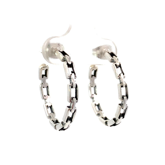 photo of a a silver chain design hoop earring on a white background