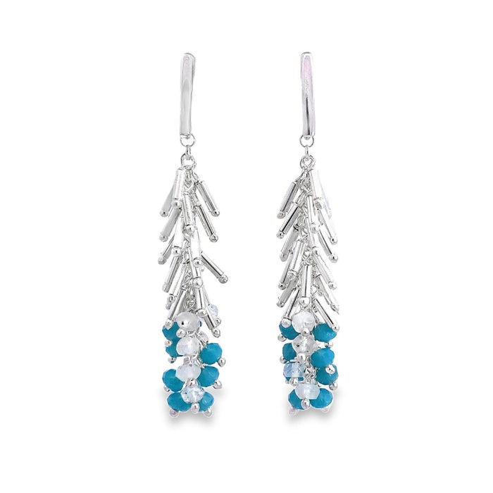 photo of a silver fringe styled earring with blue and white beads on a white background