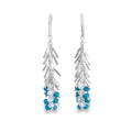 photo of a silver fringe styled earring with blue and white beads on a white background