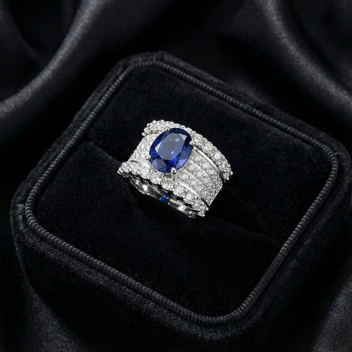 Bold, regal, and breathtaking, the Blue Majesty Crown Ring captures the very essence of royal luxury. Its deep sapphire-blue artificial gemstone sits at the center like a crowned jewel, surrounded by rows of shimmering crystals that reflect light from every angle. Crafted from premium copper, this adjustable ring wraps your finger in comfort while delivering an unmistakable presence.