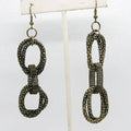 Pair of metallic chain-link earrings on a white background