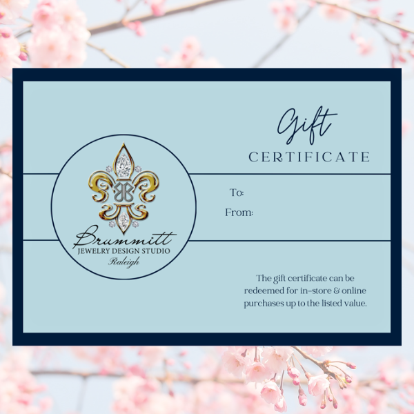 Gift certificate from Brummitt Jewelry Design Studio with decorative elements on a spring floral background