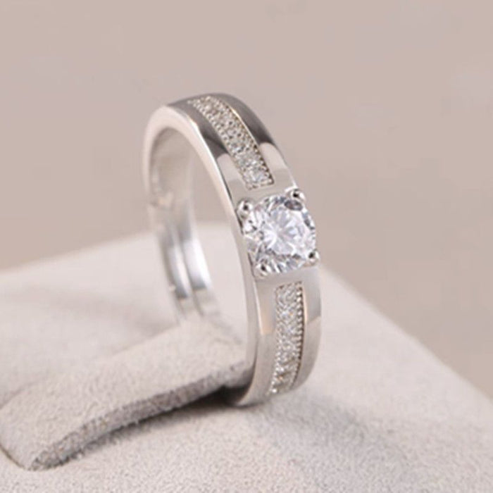 A radiant duo designed to symbolize love and commitment Celestial Promise Rings capture the sparkle of timeless romance. The brilliant center stone surrounded by delicate crystal accents creates a graceful design that feels both elegant and meaningful.