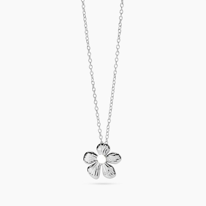 Girocollo con fiore in acciaio martellato