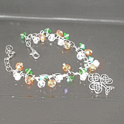 Multicolored beaded bracelet with a clasp on a dark surface