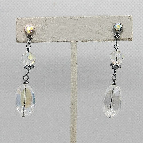Pair of crystal earrings on a gray background