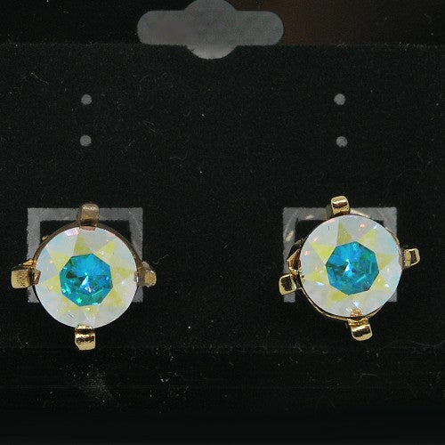 Pair of earrings with iridescent crystals  on a black background