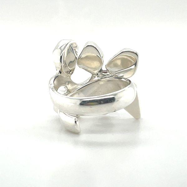 photo of a silver six stone garnet ring on a white background rear view