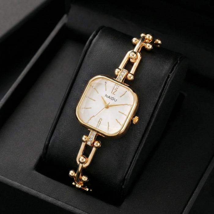 The Elite Eternity Watch redefines elegance with its sophisticated square small dial and a light luxury Cuban-inspired strap. This timepiece seamlessly blends the bold aesthetic of a high-end bracelet with the precision of a modern quartz movement, making it a standout accessory for any trendsetting wardrobe.