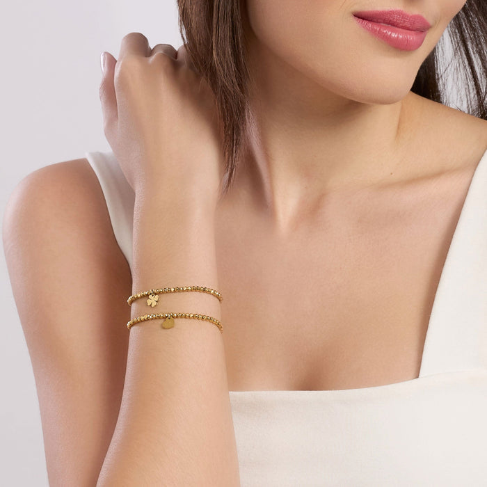 Bracciale dorato con sfere e ciondolo cuore