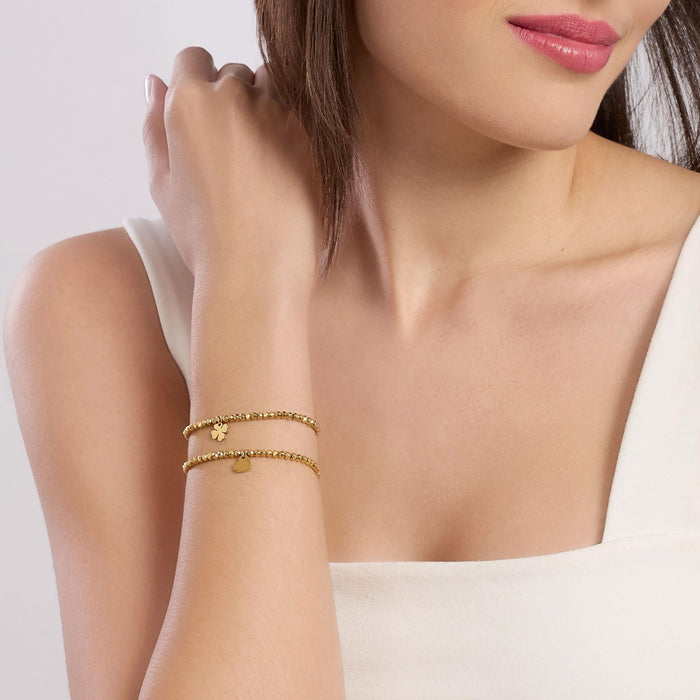 Bracciale dorato con sfere e ciondolo cuore