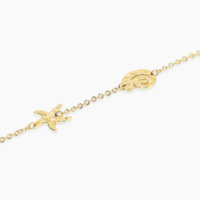 Bracciale dorato con elementi marini