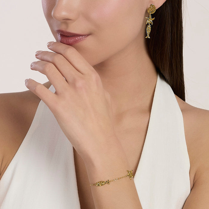 Bracciale dorato con elementi marini