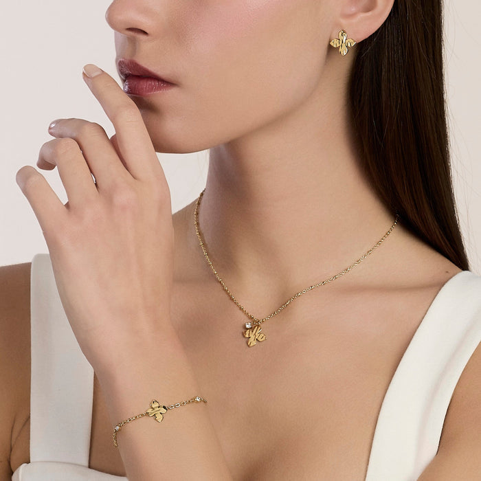 Bracciale dorato con fiori