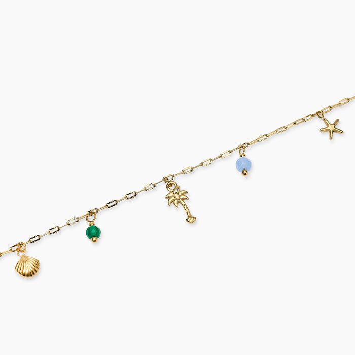 Cavigliera in acciaio dorato con charms estivi