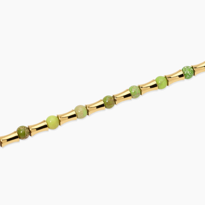 Bracciale dorato con elementi bambù e diaspri verdi