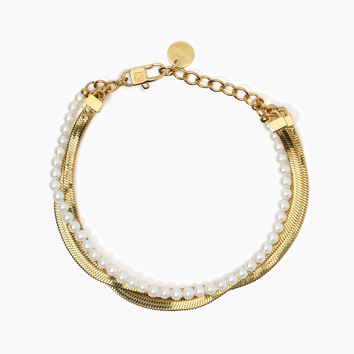 Bracciale catene e perle conchiglia in acciaio dorato