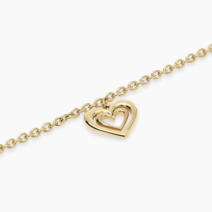 Bracciale dorato con ciondolo cuore