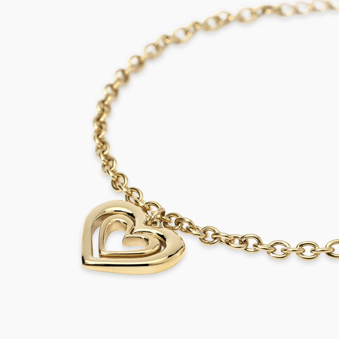 Bracciale dorato con ciondolo cuore