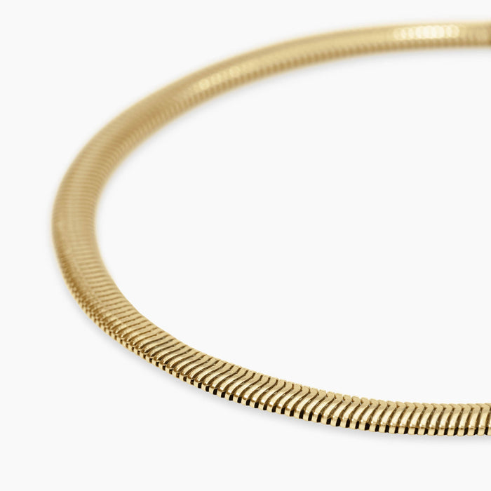 Bracciale dorato con catena snake