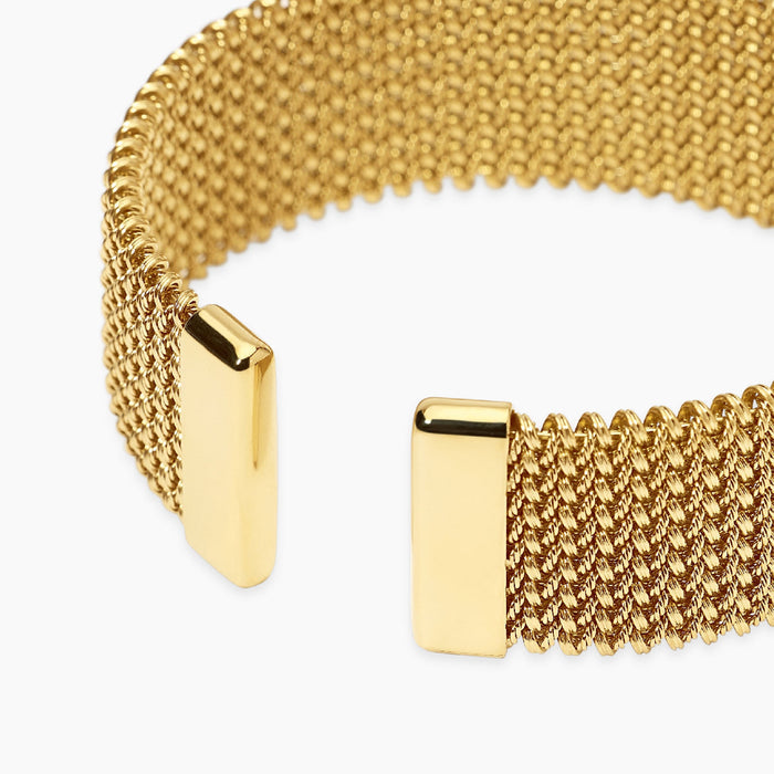 Bracciale cuff dorato con maglia mesh