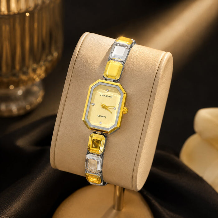 Elegant, polished, and beautifully feminine, the Golden Mosaic Watch is made for someone who loves graceful timepieces with a distinctive jewelry-inspired touch. Designed with a refined octagonal dial, dual-tone metallic detailing, and faceted bracelet links, this watch brings a radiant modern glow that feels perfect for everyday styling, office wear, special occasions, or thoughtful gifting.