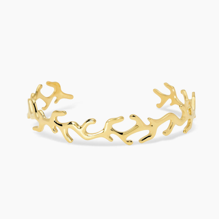 Bracciale cuff in acciaio dorato
