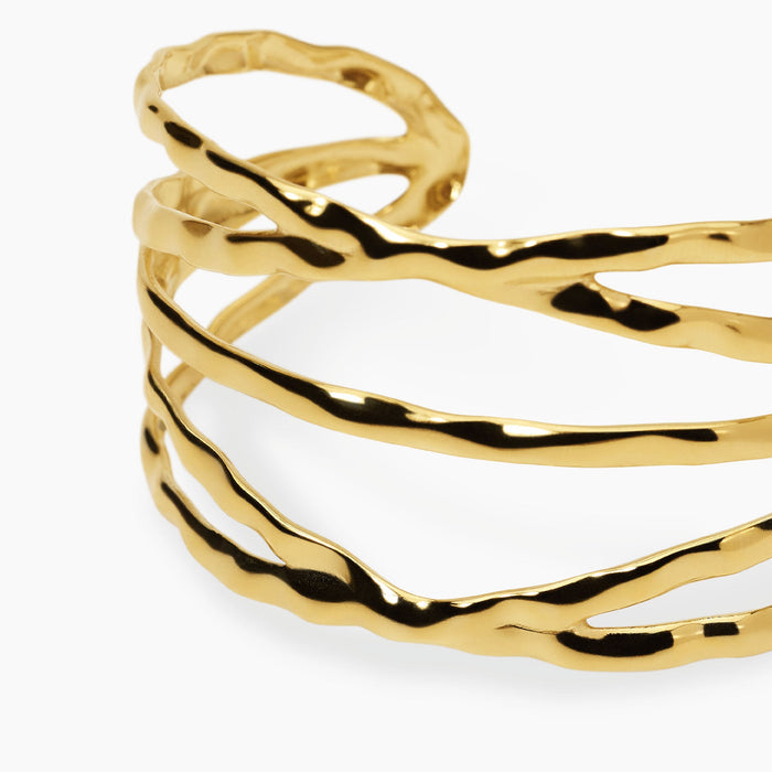 Bracciale cuff in acciaio dorato