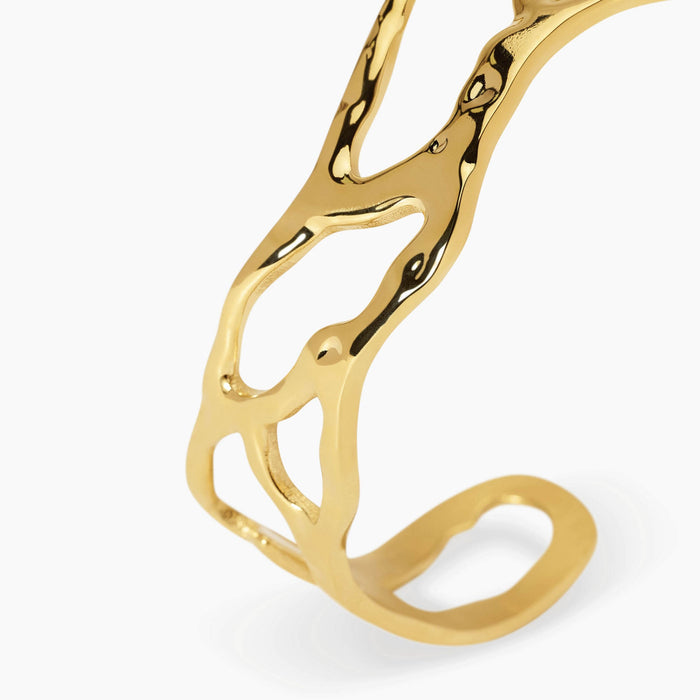 Bracciale cuff in acciaio dorato