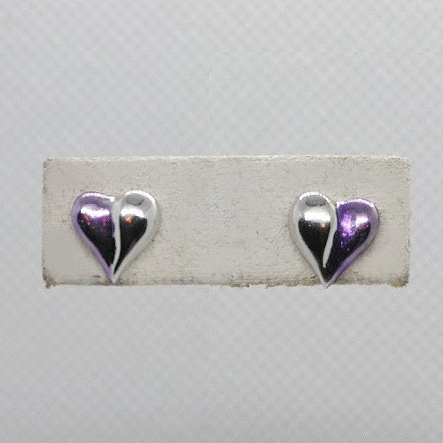 Heart-shaped earrings on a white card with a gray background