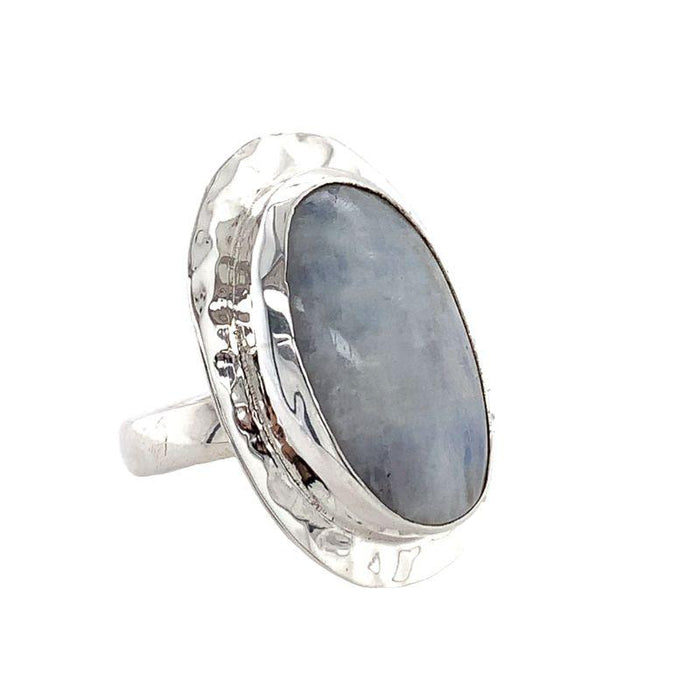 Photo of  a silver oval white moonstone ring on a white background