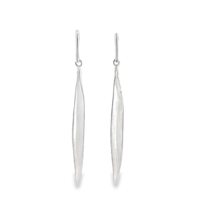 photo of a pair of long slender matte finished earrings on a white background