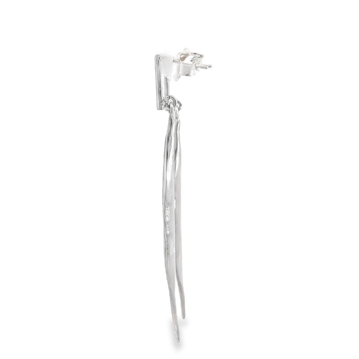 photo of a pair of long slender matte finished earrings on a white background side view