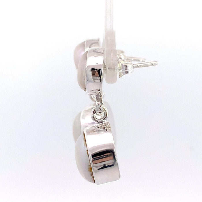 photo of refined pearl jewelry everyday wear styling on a white background-side view