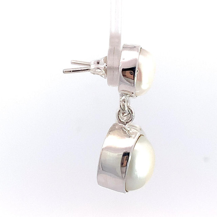 photo of refined pearl jewelry everyday wear styling on a white background-side view